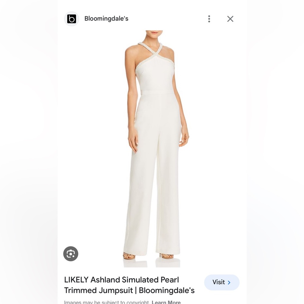 Likely brand white jumpsuit with pearl detail.  Perfect for bridal